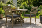 Patio armchairs with dark gray cushions
